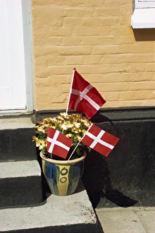 Aero Prints: Danish flags outside a house in Aeroskobing, Aero, Denmark, Scandinavia, Europe