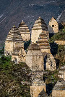 Towers Prints: Dargavs features ancient burial towers set against a mountainous backdrop in Caucasus