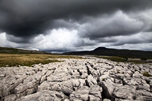 L Imestone Prints: Dark clouds over Ingleborough from Twisleton Scar