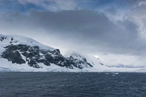 Images Dated 3rd December 2008: Dark clouds over the mountains and glaciers of Port Lockroy research station, Antarctica