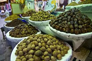 Dates, walnuts and figs for sale in the souk of the old Medina of Fez, Morocco
