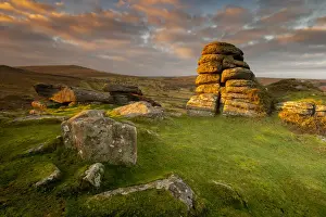 Dartmoor Prints: Dawn breaks and winter sunlight illuminates the rocks below Saddle Tor, Dartmoor