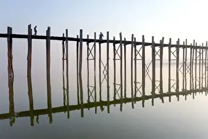 Wooden Post Prints: Dawn view of the famous U Bein teak bridge crossing Taungthaman Lake
