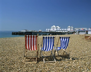Piers Prints: Empty deck chairs on the beach and the Southsea Pier, Southsea, Hampshire
