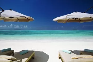Images Dated 7th December 2011: Deck chairs and tropical beach, Maldives, Indian Ocean, Asia