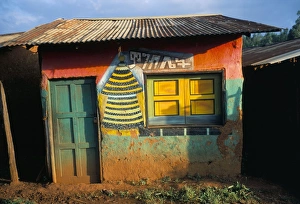 Ethiopian Prints: Decorated building in the village of Goulisoo, Oromo area, Welega state, Ethiopia, Africa