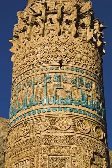 Detail of decoration on minaret including Kufic inscription in turquoise glazed tiles