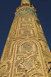 Detail of decoration on minaret including Kufic inscription in turquoise glazed tiles