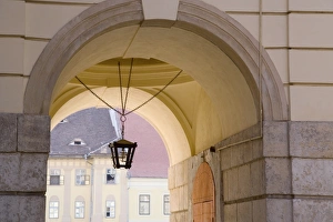 Images Dated 5th October 2006: Decorative lantern hanging under an archway in the old towns main square