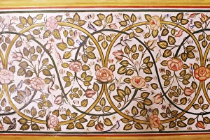 Floral Design Prints: Depiction of rose and birds painted on wall in dining area