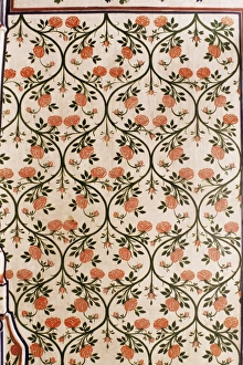 Floral Design Prints: Depiction of stylised rose paintd on wall in dining area