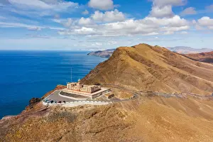 Desert mountain landscape surrounding Entallada lighthouse overlooking the ocean