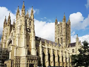 Canterbury Prints: Details of Canterbury Cathedral in Kent with notable towers and intricate architecture observed during a sunny day