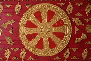 Gilded Prints: Dharma Wheel at Wat Si Muang, Vientiane, Laos, Indochina, Southeast Asia, Asia