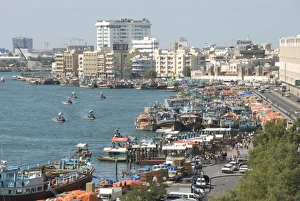 Images Dated 18th January 2008: Dhows moored for unloading alongside Deira wharves, Dubai Creek, Dubai