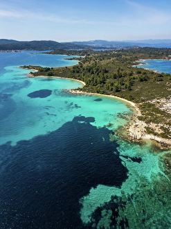 Hopping Prints: Diaporos island with wild beaches with turquoise water
