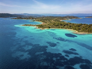Azure Prints: Diaporos island with wild beaches with turquoise water