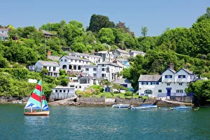 Villages Prints: A dinghy sails past the village of Boddinick near Fowey