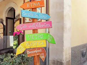 Directions Prints: Direction sign post in Ragusa Ibla showing various locations in Sicily, Italy