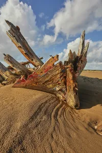Shipwreck Prints: Disintegrating wreck on the beach at Crow Point in the estuary of the Taw and Torridge Rivers near Barnstaple Devon