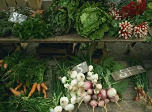 Salad Prints: Display of salad items and vegetables for sale in a market in Aquitaine, France, Europe