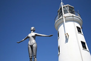 Light Houses Prints: The Diving Belle Sculpture and Lighthouse on Vincents Pier