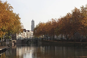 Traditionally Dutch Prints: The Dom Tower and canal waterway on a sunny autumn day, Utrecht, Utrecht Province