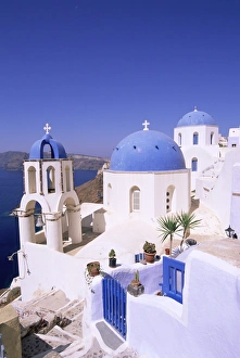 Thira Prints: Domes and bell tower of blue and white Christian church