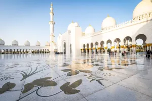 Colonnade Prints: The domes and minarets of Abu Dhabis Grand Mosque viewed across the large marble