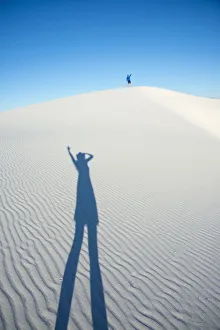 Two dorks playing with shadows in White Sands National Park, New Mexico