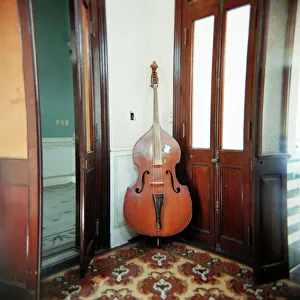Creativity Prints: Double bass propped against a wall, Cienfuegos, Cuba, West Indies, Central America
