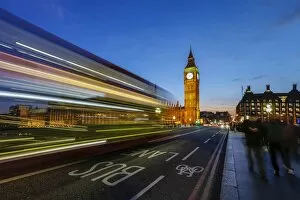 Houses Of Parliament Collection: Doubledecker bus runs towards Big Ben (Elizabeth Tower), located north end of the