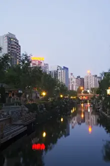 Xizhimen Prints: Downtown buildings illuminated in Xizhimen area of Beijing, China, Asia