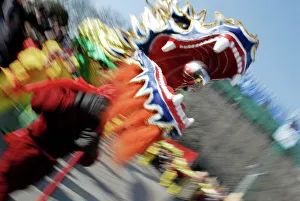 Festival Prints: Dragon dance during Chinese New Year, Paris, Ile de France, France, Europe