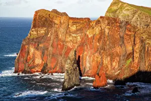 Madeira Prints: Dramatic coastline of rocks along the shore with ocean waves in the background on Madeira