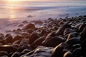 Foam Prints: Dramatic coastline with rocks at sunset in Ribeira da Janela, Madeira, Spain