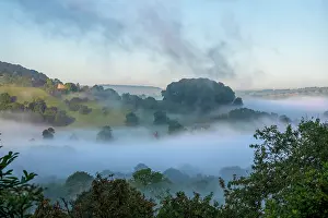 Rolling Prints: Dramatic mist in the valley below Peak Tor, United Kingdom