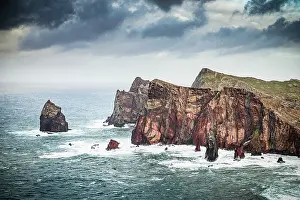 Madeira Prints: Dramatic rocks rise from the ocean along the coastline near Canial in Madeira