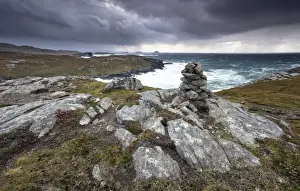 Stack Prints: Dramatic rocky coastline above Gearrannan Blackhouse Village