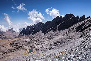Picturesque Scenery Prints: Dramatic rugged mountain range with a lake