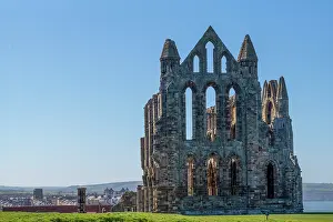 Touristic Prints: The dramatic ruins of St Hilda's Abbey on the cliftop overlooking Whiby In the county of Yorkshire