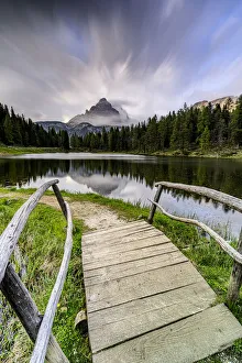 Connections Gallery: Dramatic sky with clouds over Tre Cime di Lavaredo, view from lake Antorno at dawn, Dolomites