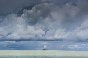 One Object Prints: Dramatic sky over a little island in the Rock islands, Palau, Central Pacific, Pacific