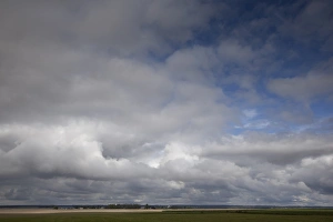 Ominous Prints: Dramatic sky over Normandy countryside, Normandy, France, Europe