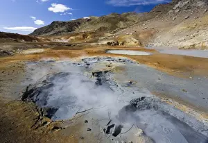 Mineral Prints: Dramatic volcanic landscape with boiling mudpools in geothermal area on Reykjanes Peninsula