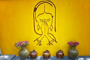 Illustration Prints: Drawing of praying woman on a yellow wall in Lijiang, Yunnan, China, Asia