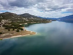 Macedonia Prints: Drone aerial view of camper vans parked on a wild spot at Lake Polyfyto