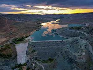Cappadocia Prints: Drone view of Akkoy dam lake during sunset with reflections in Cappadocia