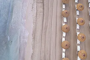 Sun Lounger Prints: Drone view of beach straw umbrellas on an empty beach