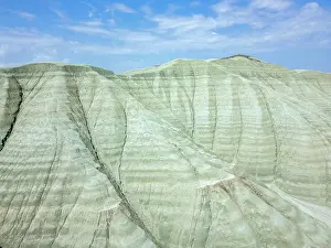 Uninhabited Prints: Drone view of grey mountains in dry landscape of Turkey highlighting natural formations and terrain features